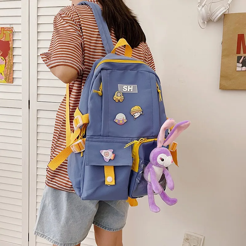 Модный женский рюкзак Kawaii Doll, трендовый школьный рюкзак с знаком для девочек, нейлоновые водонепроницаемые вместительные дорожные рюкзаки