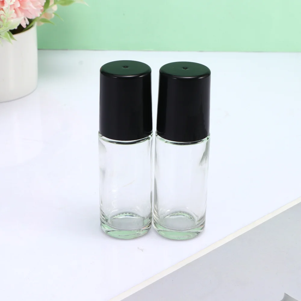 

4pcs 30ml Empty Roll-on Bottle Beads Essential Oil Bottle Portable Sub Bottle Anti-leak Small Sample Bottle for Home Use (Black