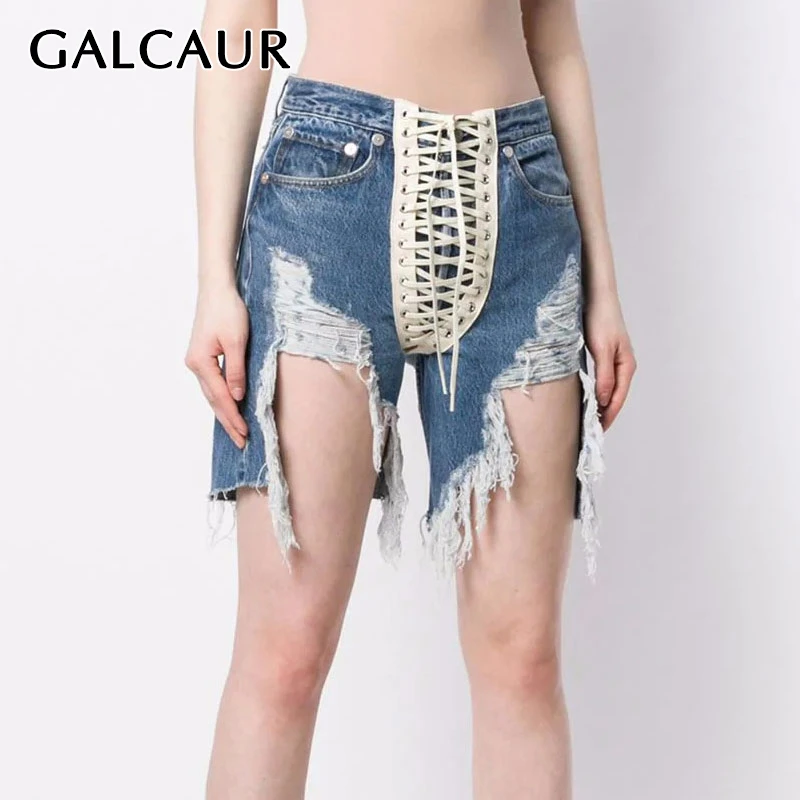 

GALCAUR Ripped Hole Denim Short Pants Women High Waist Lace Up Asymmetric Frayed Straight Shorts Female 2020 Streetwear Tide