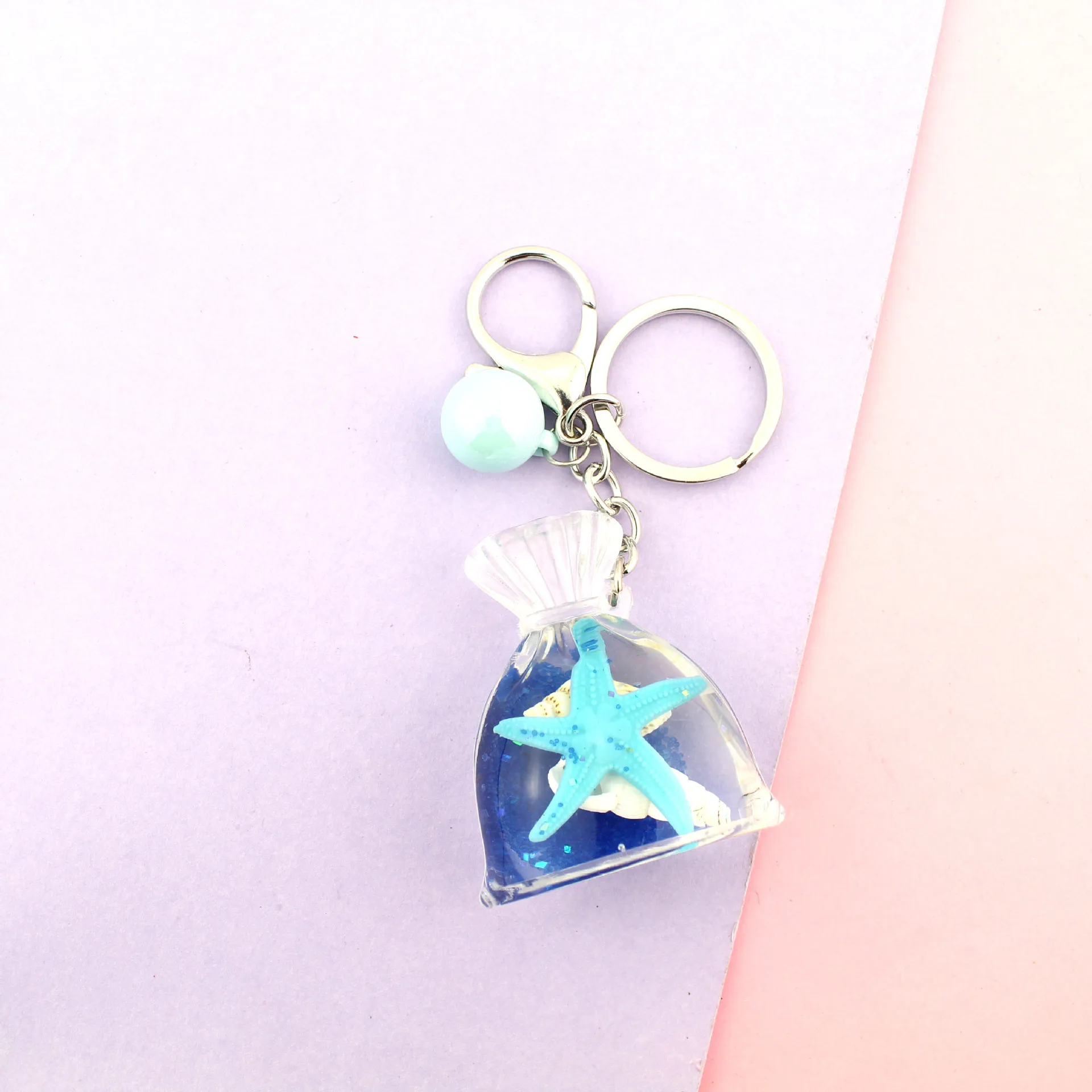 

Creative Catch Summer Starfish Shell Quicksand Bag Pendant Key Chain for Your Ocean Car Purse Pendant