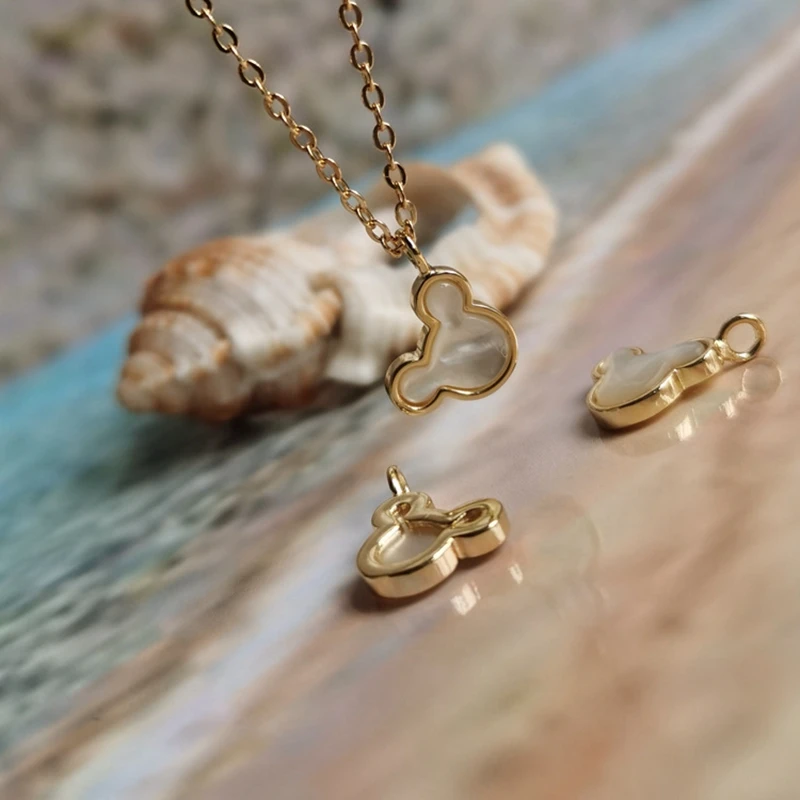 

Free Shipping(10pcs/lot)Cartoon Shell Pendant 18K Gold Plating Tribal Jewelery Craft Accessories DIY