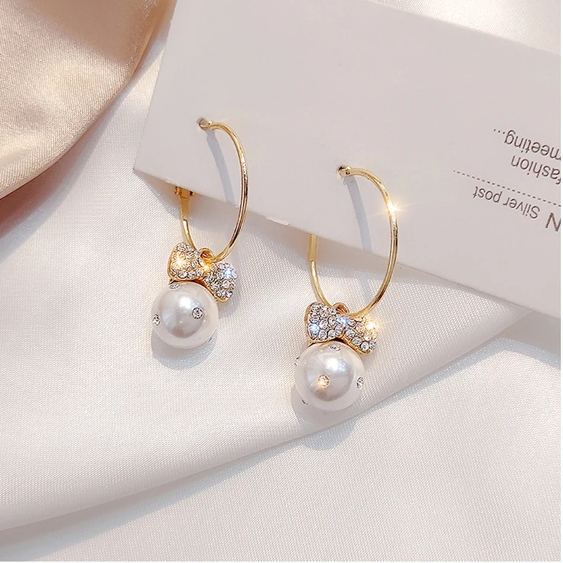 

Bowknot long tassel pearl pendant temperament earrings Korean version of high quality earrings exquisite Trend Women's Earrings
