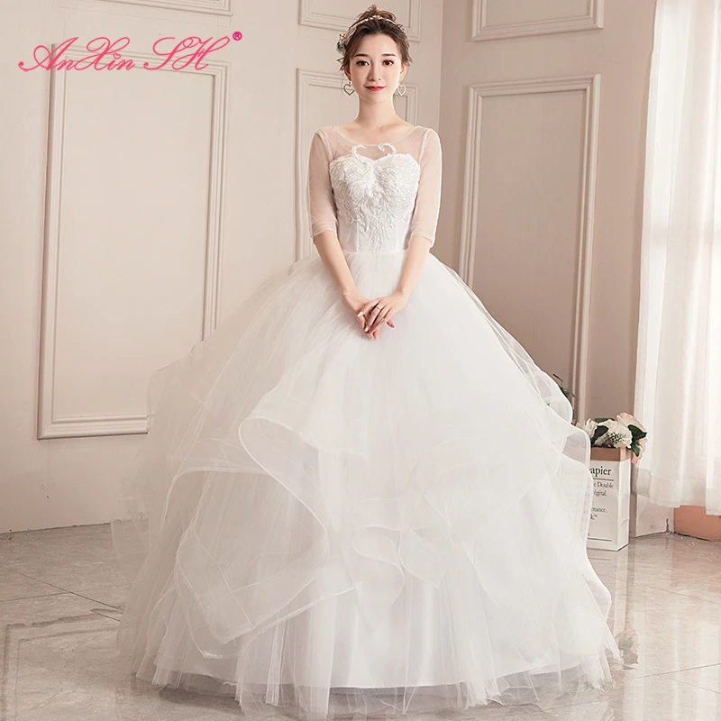 

AnXin SH princess flower lace white wedding dress dubai party vintage illusion o neck half sleeve bride ruffles wedding dress