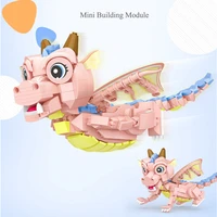 711pcs mini building blocks cartoon pink dragon model bricks diy cute animal dolls assembled building blocks childrens toys