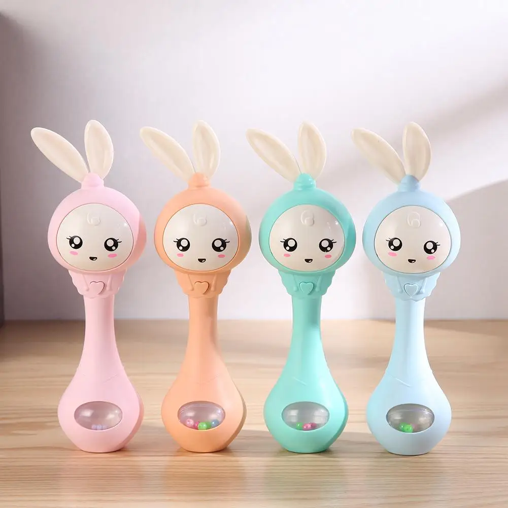

Baby Hand Bells Rattles Puzzle Music Sound Light Shaking Toys For 0-12M Newborn Infant Early Educational Toy Cute Cartoon Rabbit