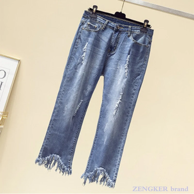 

Женские весенние джинсы большого размера с высокой талией, тонкие и универсальные корейские расклешенные джинсы с необработанными краями, ...