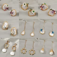 2021 trendy imitation pearl dangle earrings hand wound fashion popular long tassel butterfly flower drop earrings for women