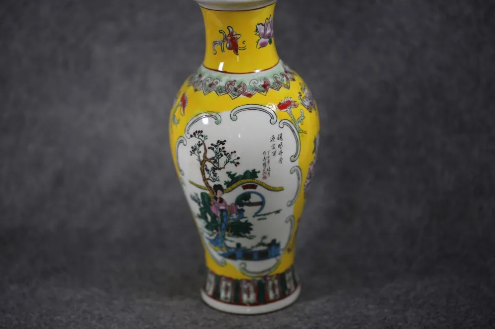 

Exquisite ancient Chinese porcelain vase, painted with flowers and marked with Qianlong
