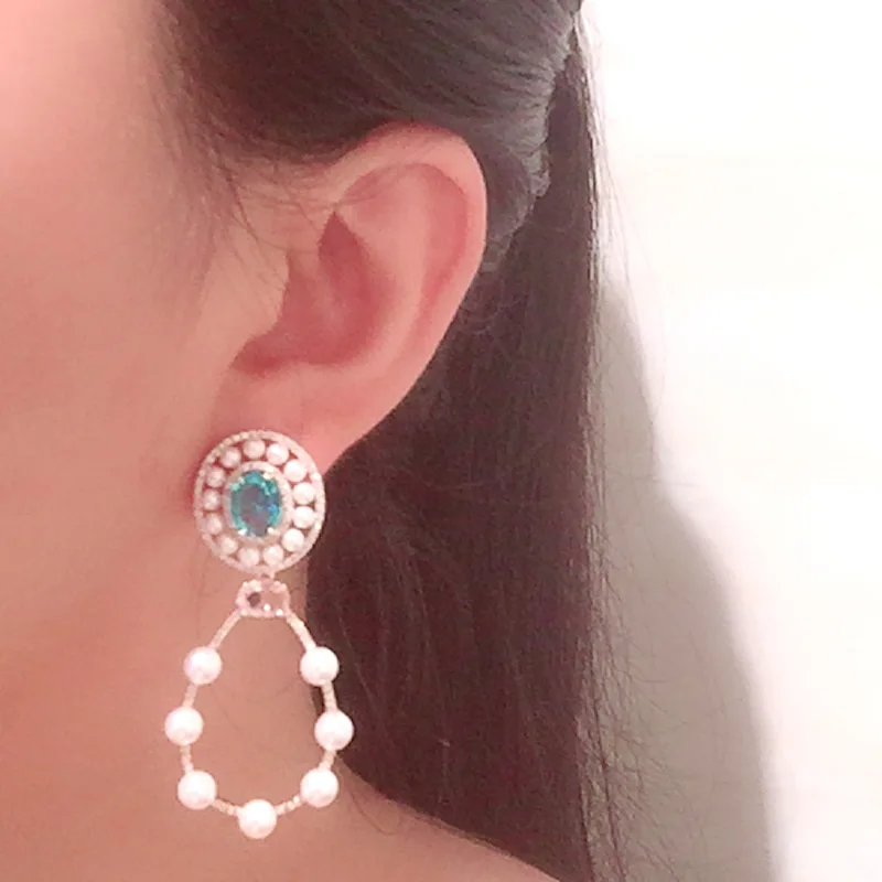 

Hollow pearl earrings oval fairy simple atmosphere ins online celebrity sweet lady long tassel drop earrings