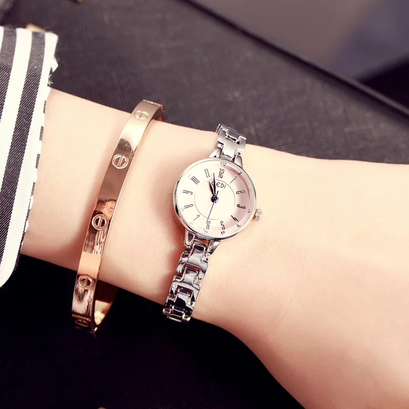 

Digital face trend fashion student waterproof non-mechanical compact quartz fashion bracelet watch women's watch