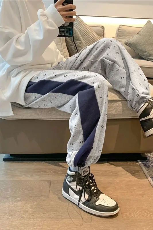 

2021 Spring And Autumn New Youth Popular Loose Color Matching Simple Smiley Printed Sports Pants Fashion Casual Trousers