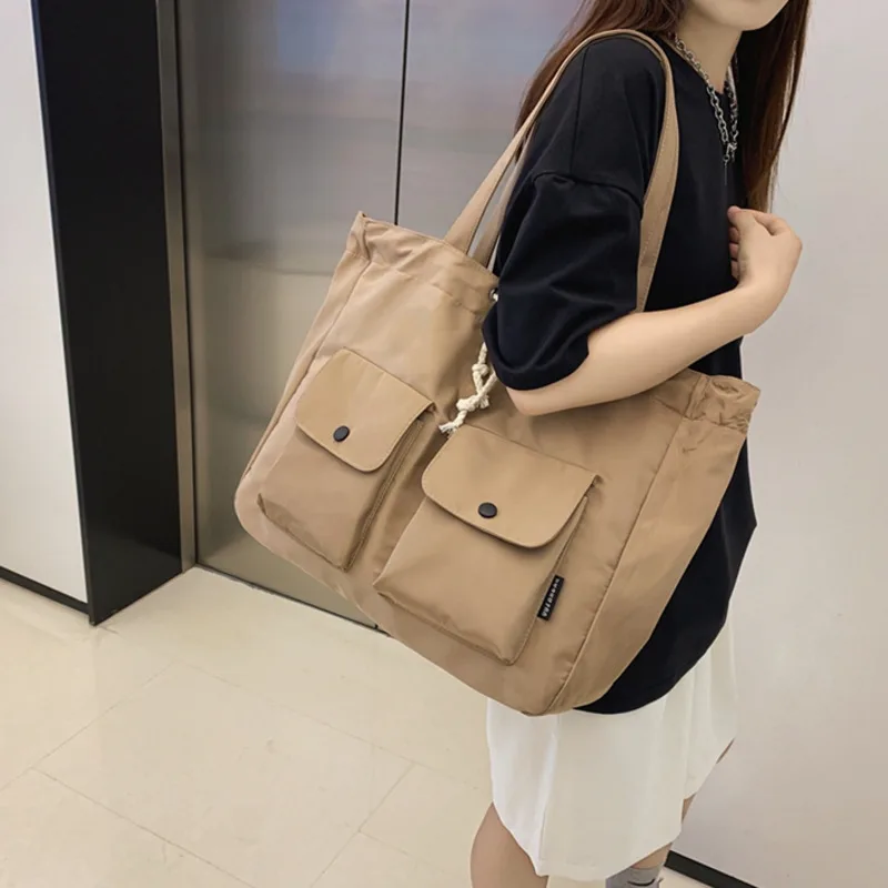 

Women's Travel Bags Fashion Large Capacity Shoulder Bag High Quality Nylon Drawstring Shopper Multi-pocket Handbags New