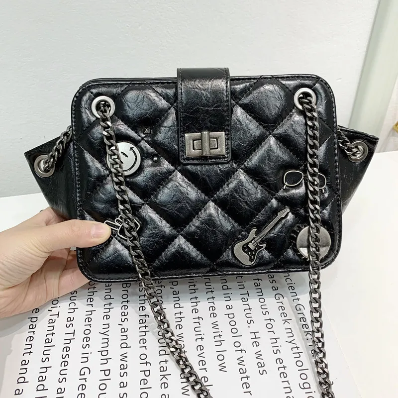 

Xiaoxiangfeng Lingge Chain Dumpling Bag Female 2021 New Niche Trend Wild Personality Badge Single Shoulder Diagonal Bag Bolso