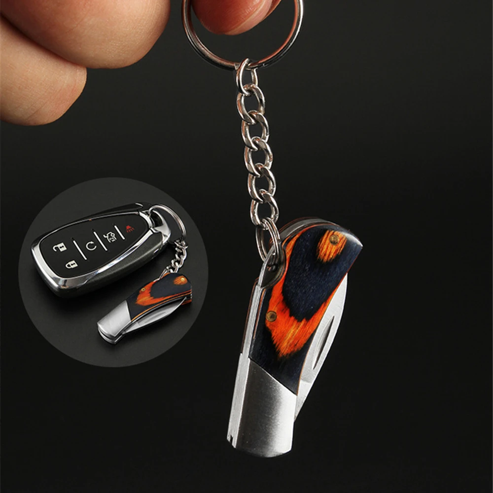 

Pocket Mini Blade Fold Key Ring Portable Outdoor Camp Knife Keychain Peeler Survive Kit Gadget Package Box Opener Multi Tools