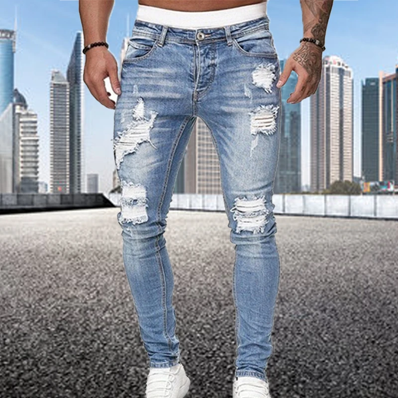 

Модные трендовые мужские пикантные джинсовые брюки с дырками, повседневные осенние мужские рваные узкие брюки, облегающие байкерские джин...