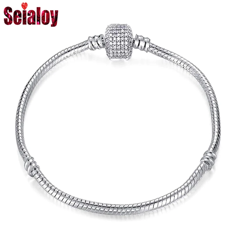 Плотный браслет Seialoy из розового золота с инкрустацией в форме сердца и змеиная