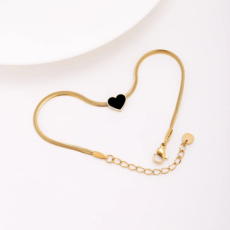 Женский браслет с подвеской в виде сердца золотистый цепочкой елочку трендовая