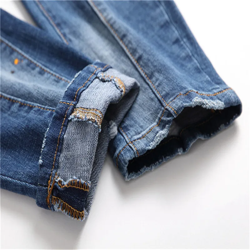 Men's Large Size Slimming Hole Taping Elastic Blue Tight Casual Fashion Versatile Waist Small Feet Jeans Pants