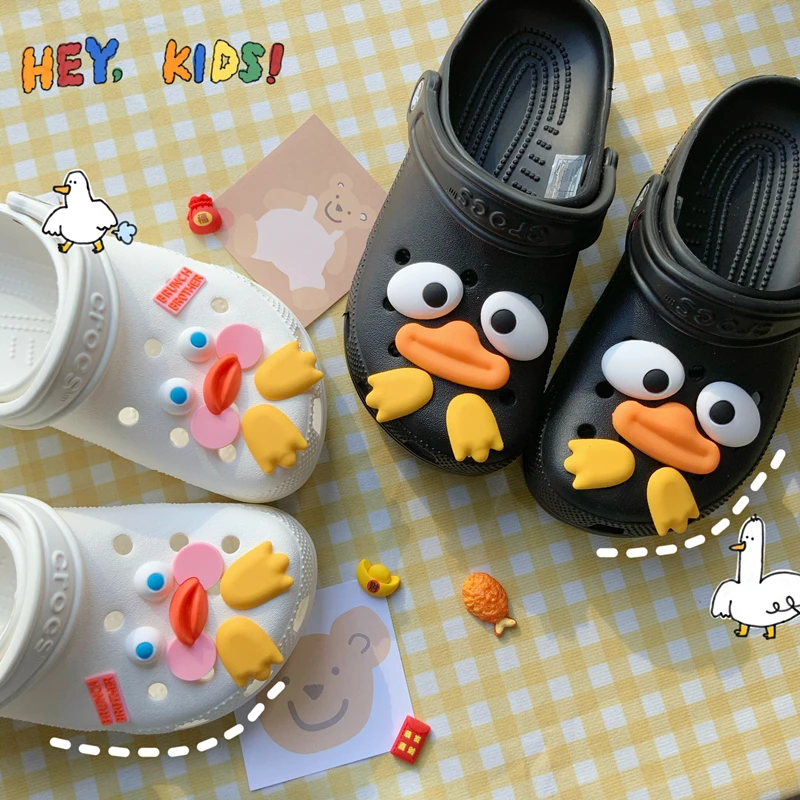 

Забавные милые Подвески для обуви Crocs, мультяшная утка, прекрасное украшение Croc, стильные подвески для детей, дизайнерские аксессуары для жи...