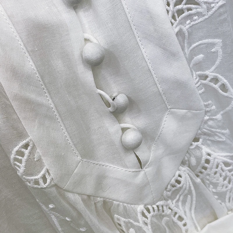 

Spring and summer ramie hollow out Lantern Sleeve loose shirt women's solid color stitching embroidery versatile top