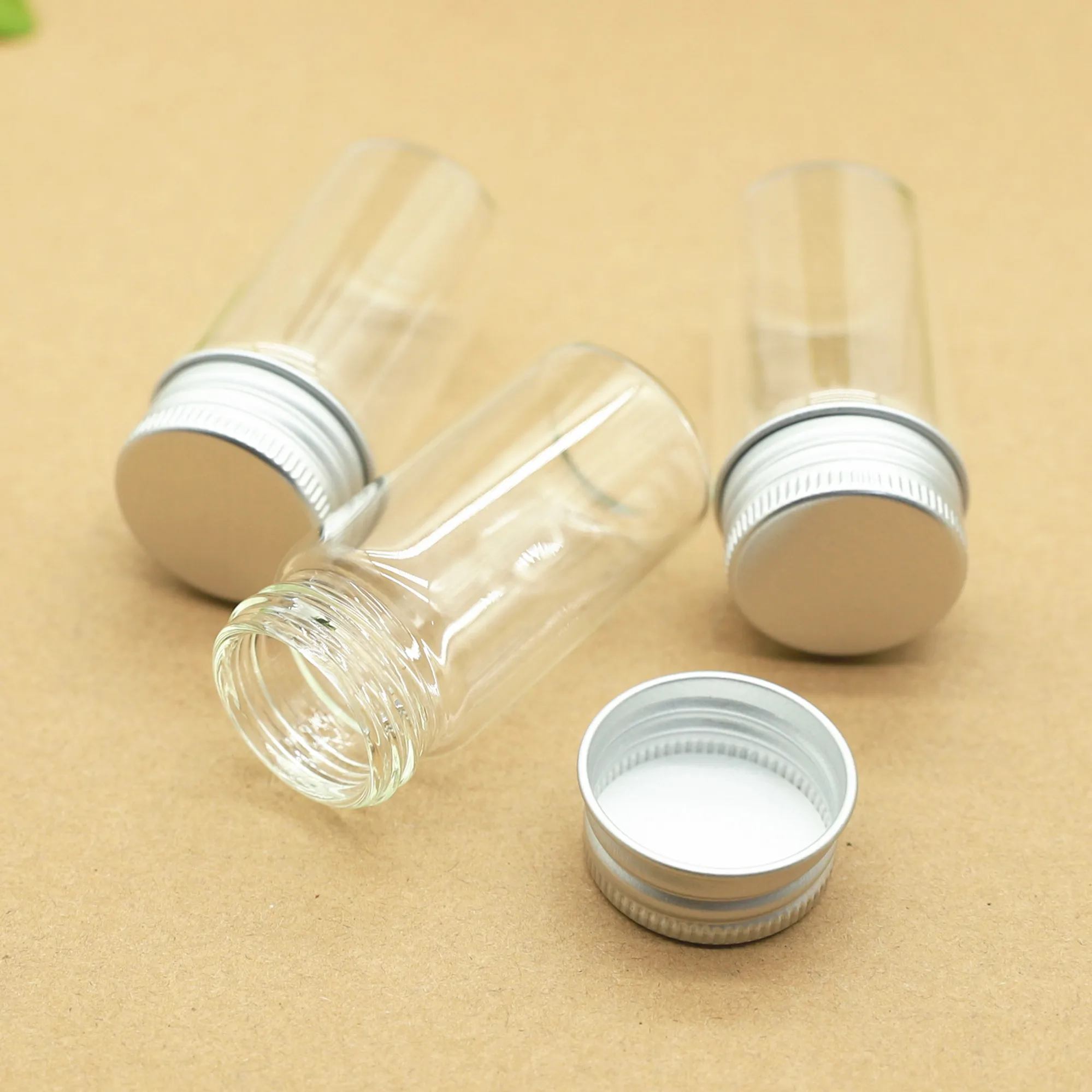 

24 pieces 30*60mm 25ml Cute Small Glass Bottles Aluminum Caps Glass Perfume Bottles Tiny Jars Vials Transparent Glass Containers