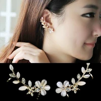 hot sale 2 pcspair women crystal rhinestone flower cuff ear bone clips non piercing earrings leftright ear clip trendy female