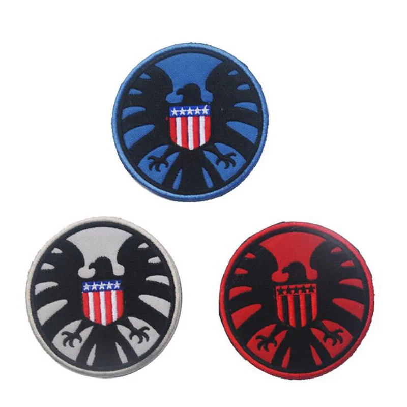 Значок девять змеиных родов Отдел отпуска и логотип агента подписанный двойной