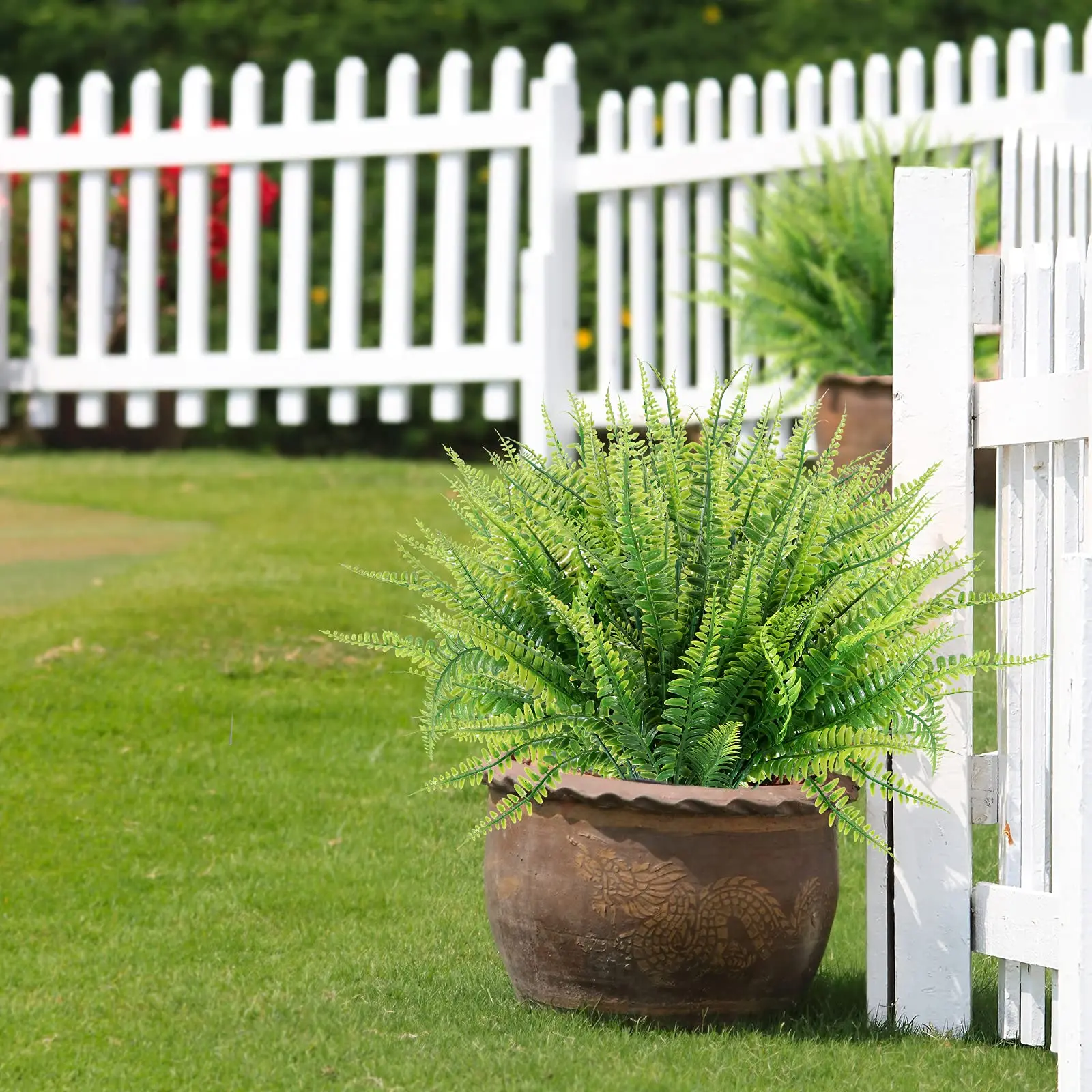 Искусственные растения ненастоящие Бостон папоротник зелени на открытом