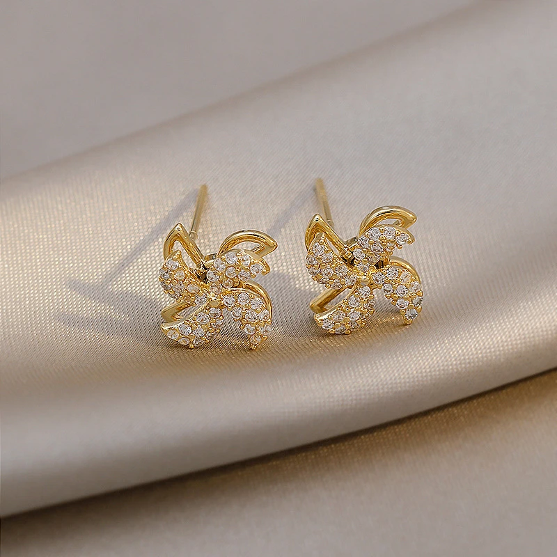 

2021 new ladies rotatable golden windmill earrings Korean fashion trendy hot selling girls unusual jewelry gifts accessories