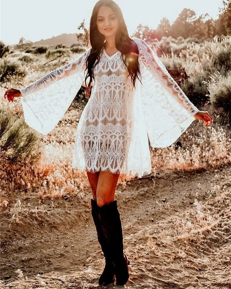 

European and American summer new lace embroidered trumpet sleeve beach skirt sexy hollow out holiday skirt bikini blouse