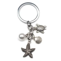 design new dolphin shell starfish alloy pendant keychain vintage pearl pendant keychain man woman keychain party souvenir gift