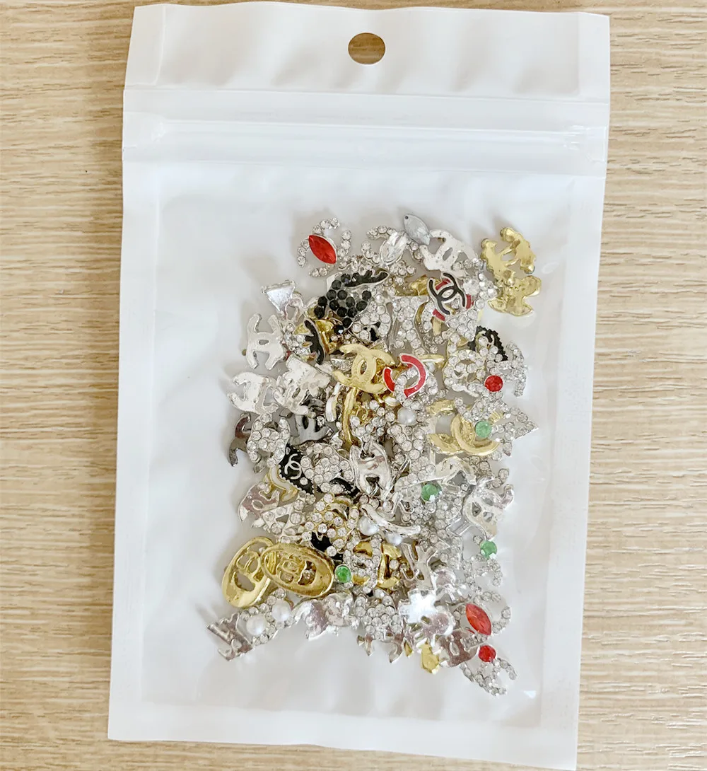 

Newest 100pcs/bag OEM Logo 3D Alloy Butterfly Nail Art Zircon Pearl Metal Manicure Nails DIY Accessories Nail Decoration