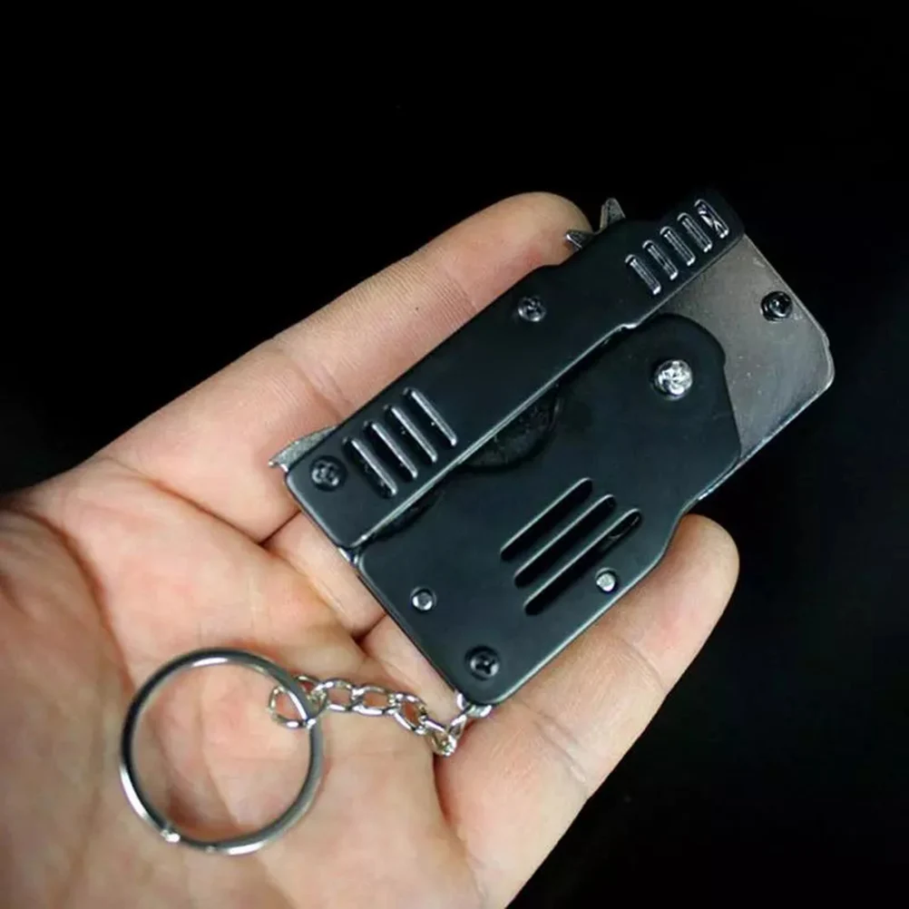 

Mini Folding Stainless steel Rubber Band Launcher Gun Hand Pistol Guns Shooting Toy Gifts Boys Outdoor Fun Sports For Kids