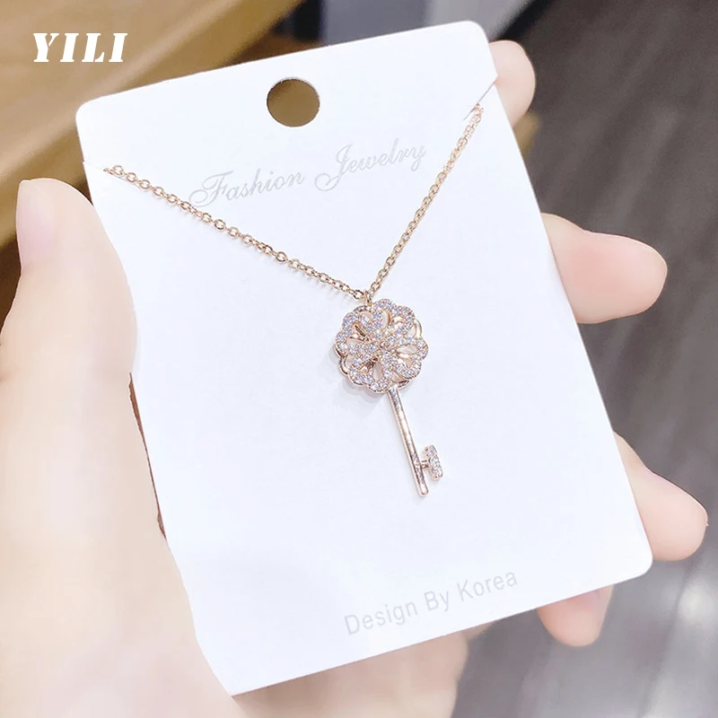

Модное ожерелье с подвеской в виде ключа с вращающейся мельницей, корейское ожерелье из розового золота с кубическим цирконием для женщин, ...