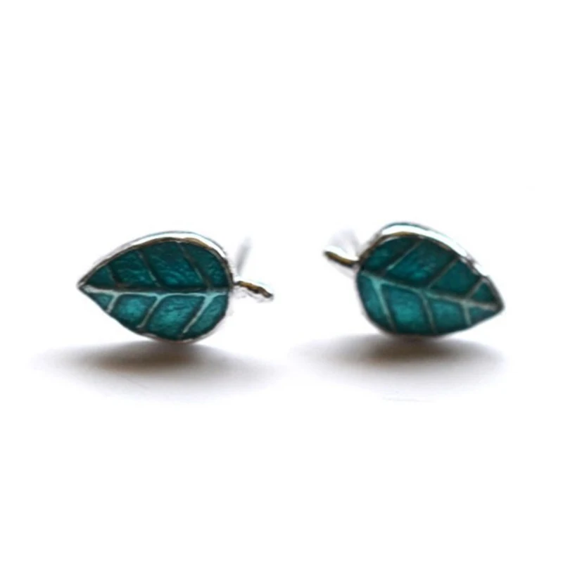 

Женские серьги-гвоздики из серебра 925 пробы с зелеными листьями