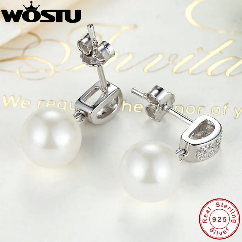 Женские серьги-подвески из серебра 100% пробы с прозрачным фианитом и жемчугом |