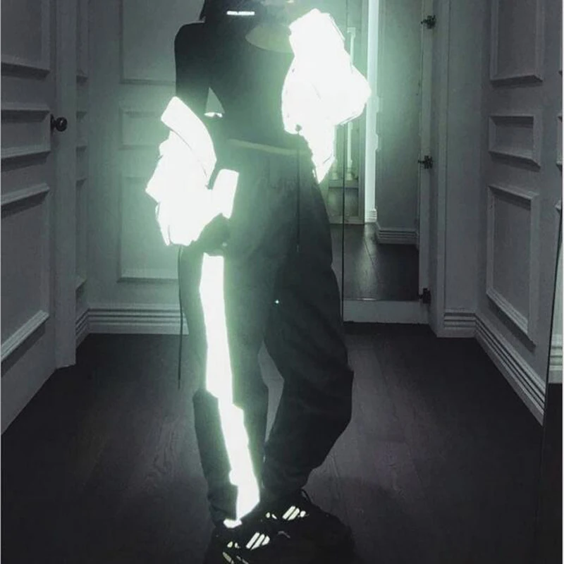 

Popular 2019 New Hip Hop Pants Women Cool Sweatpant flash Reflective Pants High Street Women solid stripe streetwear trousers