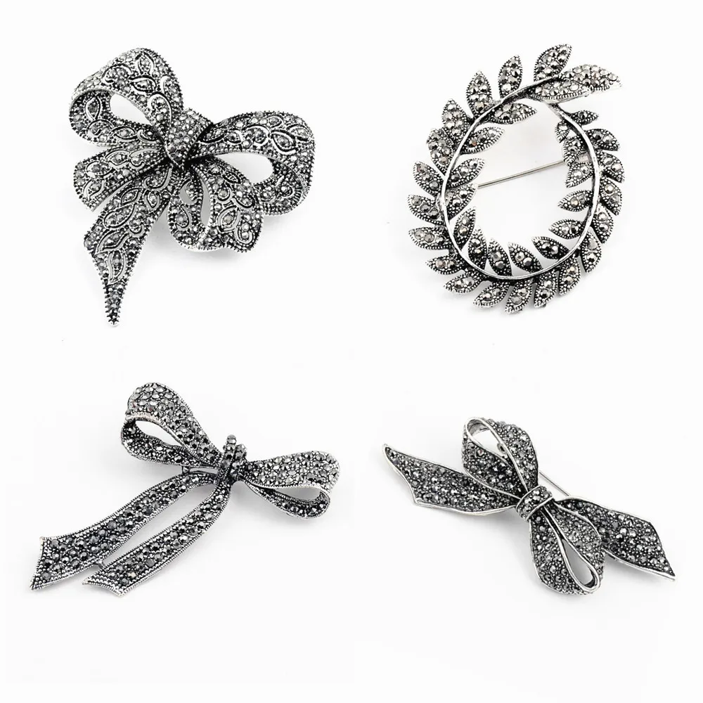 

Gun Black Big Bowknot Brooches for Women Luxury Jewelry Men Olive Branch Pin Brooch Rhinestone Metal Pin Girl Clothes Accessory