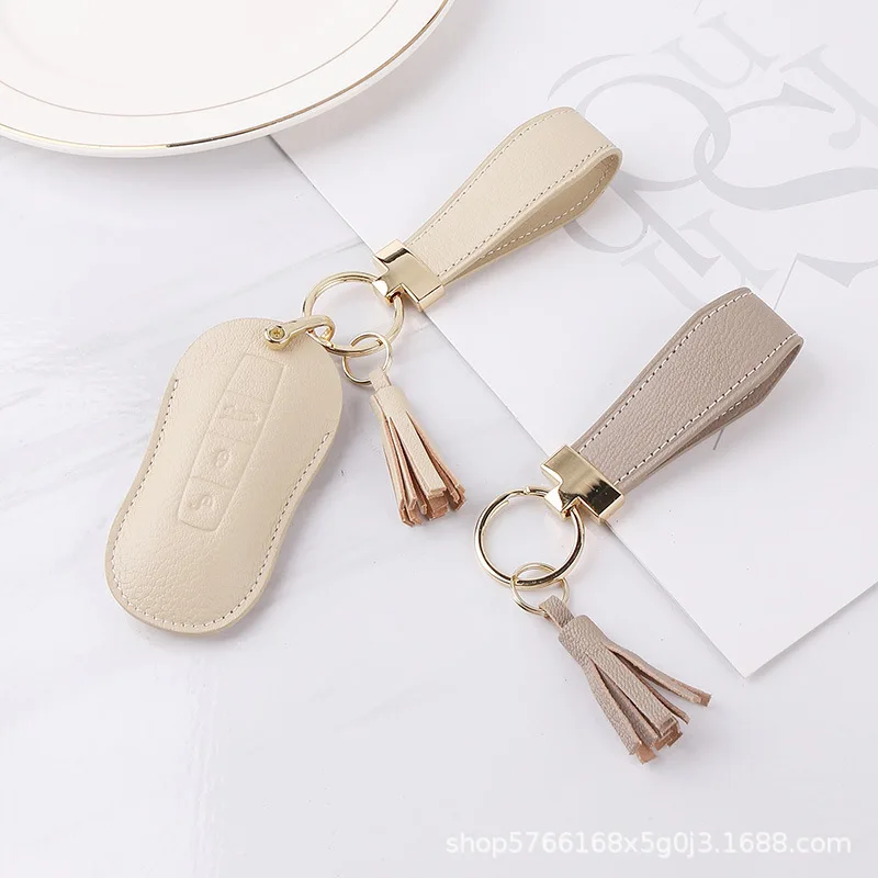 

Suitable for porsche key sets manual tassel pendant is small adorn article (double French goat skin car key chain