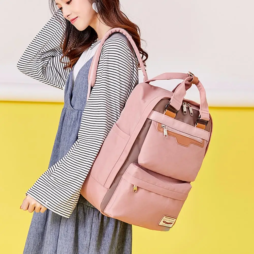 

2020 new middle school student bag female large-capacity backpack waterproof nylon bag child school bag elementary school bag
