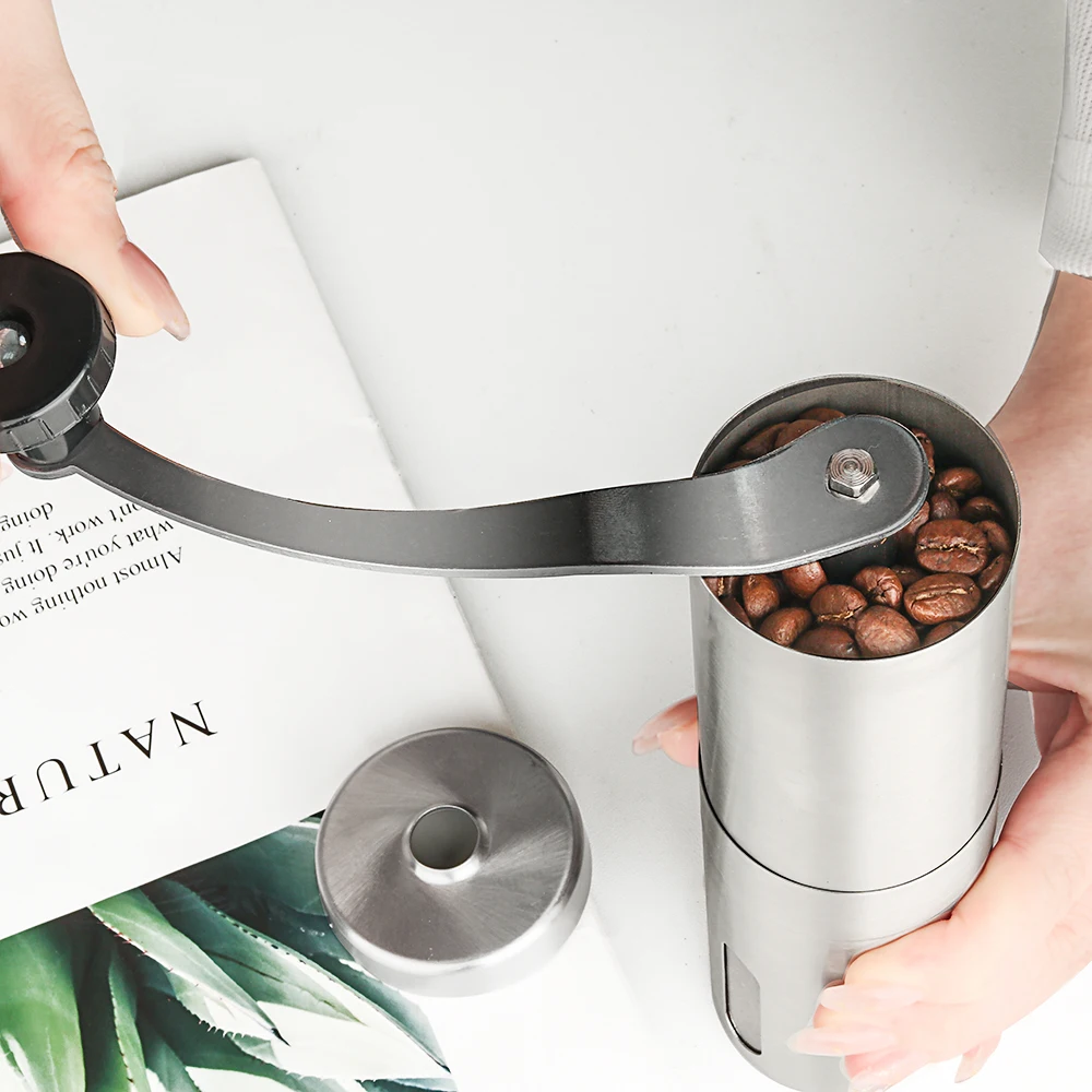 

Manual Silver Coffee Grinder Mini Stainless Steel Hand Manual Handmade Coffee Bean Burr Grinders Mill Kitchen Tool Grinders