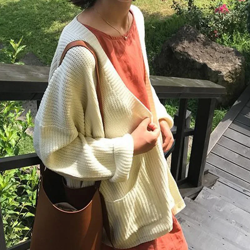 Женский вязаный свитер с длинным рукавом однотонный однобортный свободного кроя