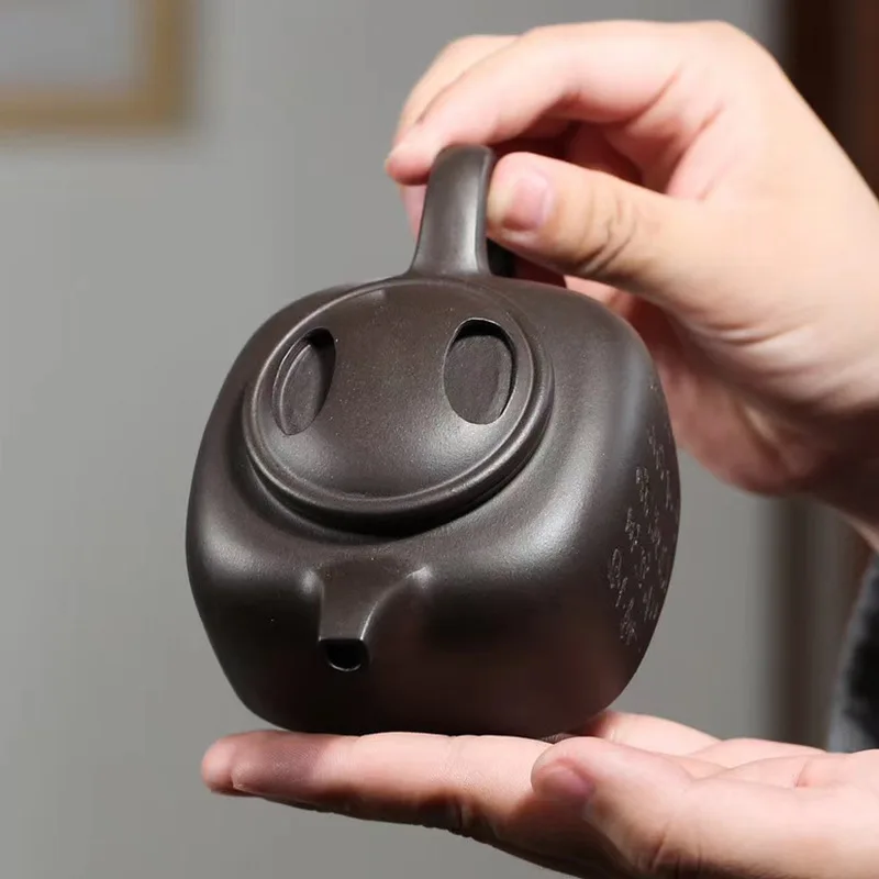 

Yixing purple clay teapot with square bottom and caoqing teapot