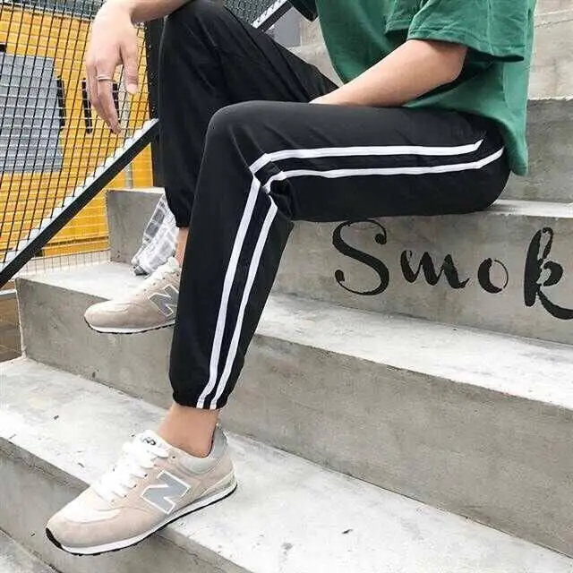 

Autumn trendy brand sports pants men's loose-fitting student tie-leg casual pants men's students Korean men's long pants men