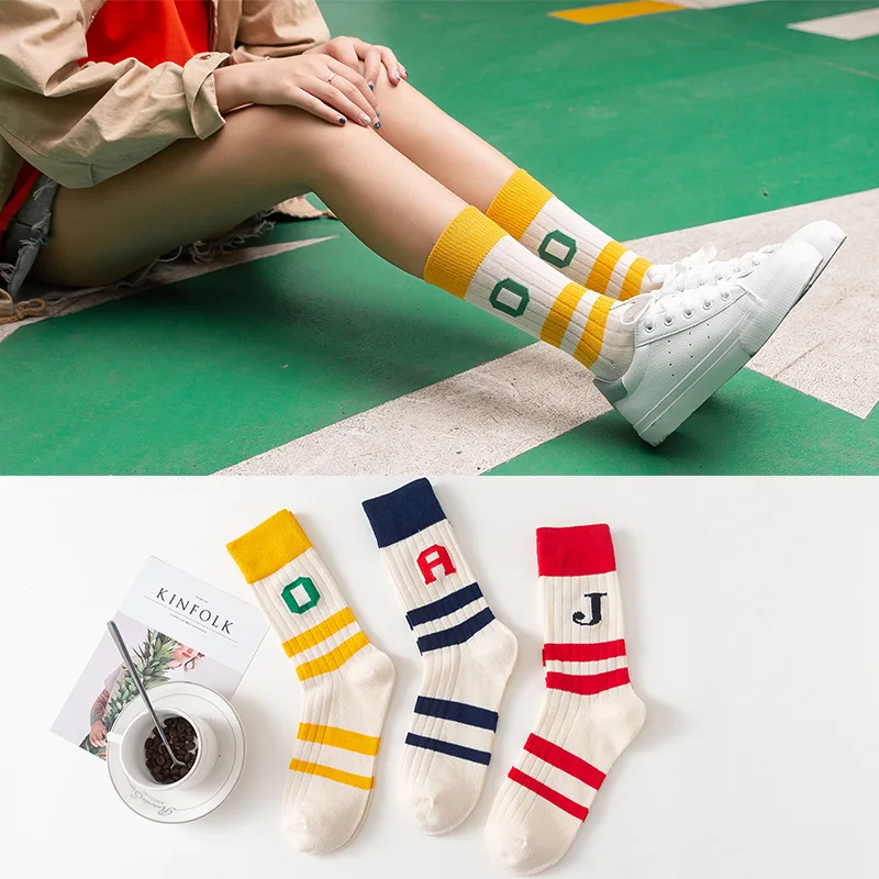 

New casual striped personality letter tube socks ins tide socks Korean version of Harajuku street shooting cute college sports s