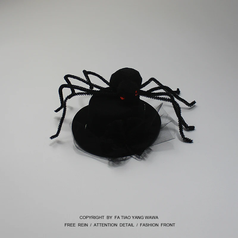 

Bored with wearing a spider on your head! Spider little hat with dark bow