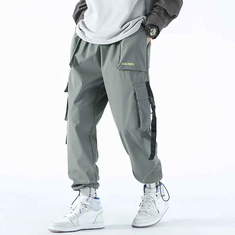 

Мужские брюки-карго с боковыми карманами, черные шаровары с лентами в стиле хип-хоп, повседневные мужские джоггеры, брюки, модная уличная од...