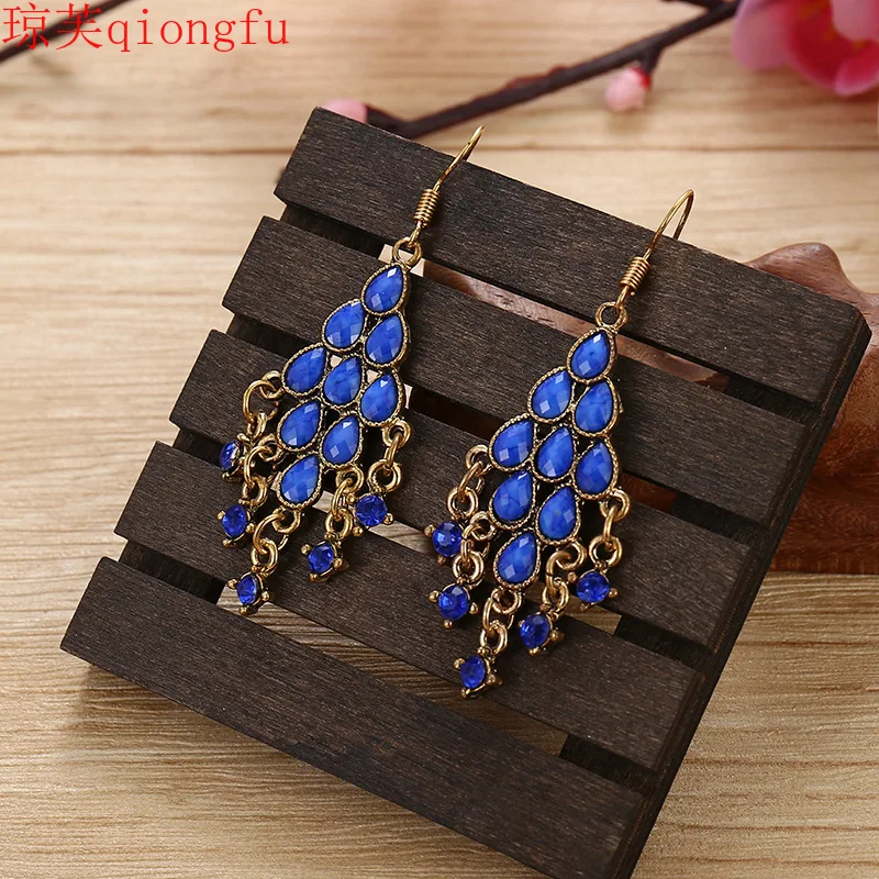 

Bohemia 2021 Personality Creative Accessories Peacock Tassel Fan Earrings Female Earrings Fashion Jewelry KR(Origin) US(Origin)