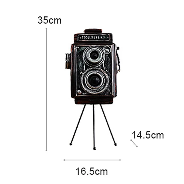 Фигурка камера. Прикольные статуэтки. Камерамэн игрушка. Статуэтка камеры. Старый фотоаппарат.