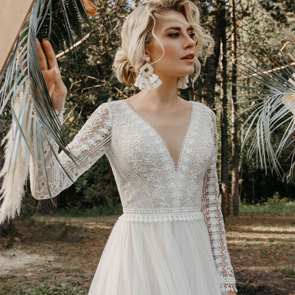 

Sexy Beach Wedding Dresses 2021 Long Sleeves V Neck See through Lace Backless Bridal Gown A Line Design